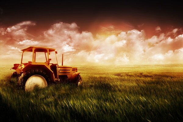 The tractor is standing in a green field without a tractor driver