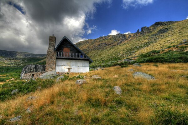 A house high in the mountains without trees