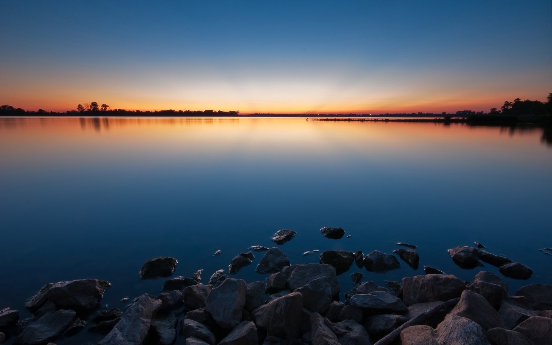 steine wasser see sonnenuntergang