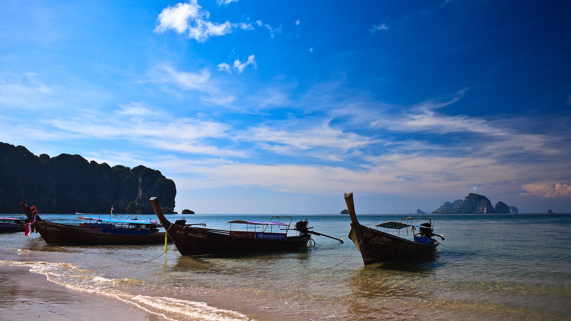 thailand longboat sun sea mountain