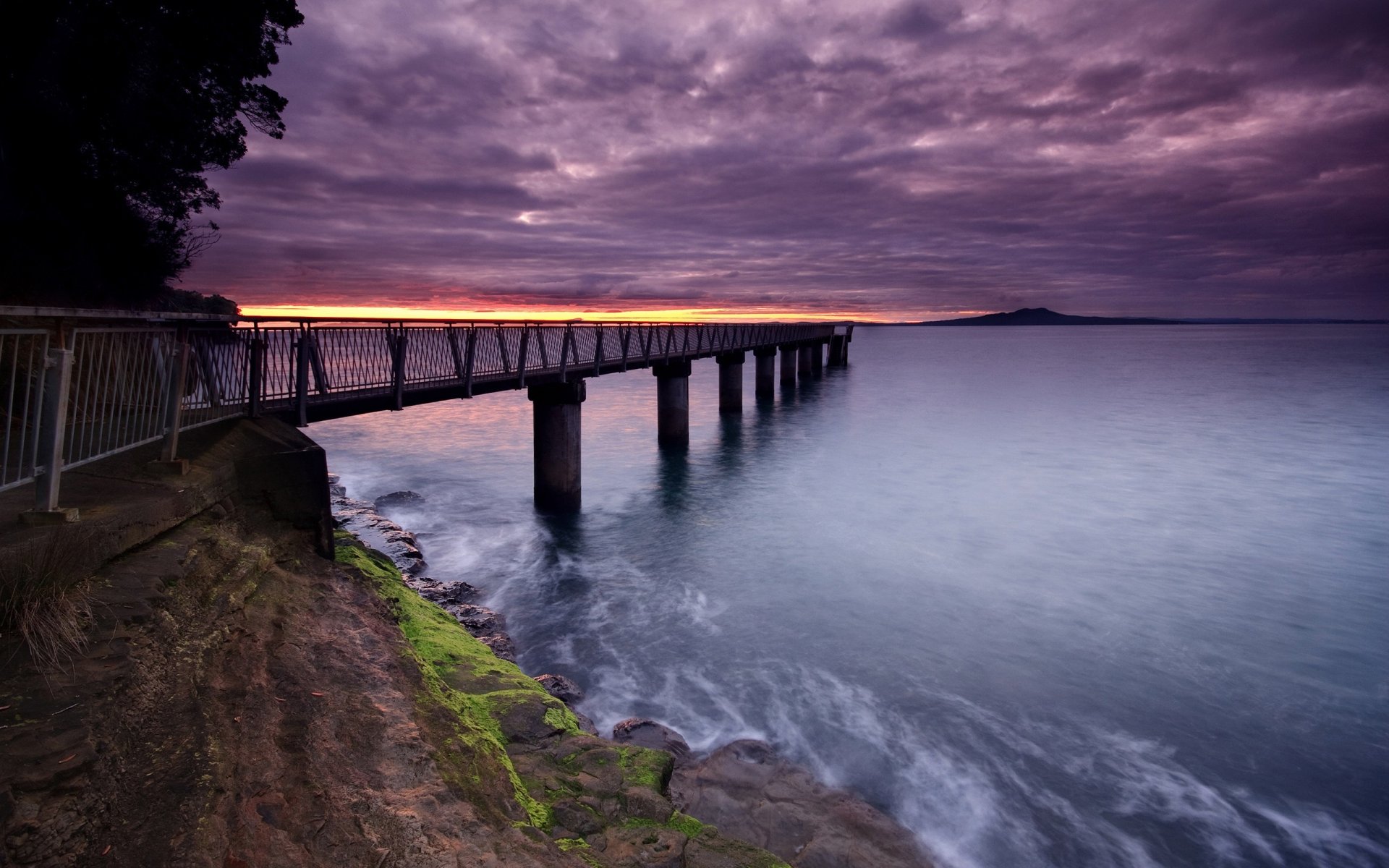 nuvole acqua molo tramonto