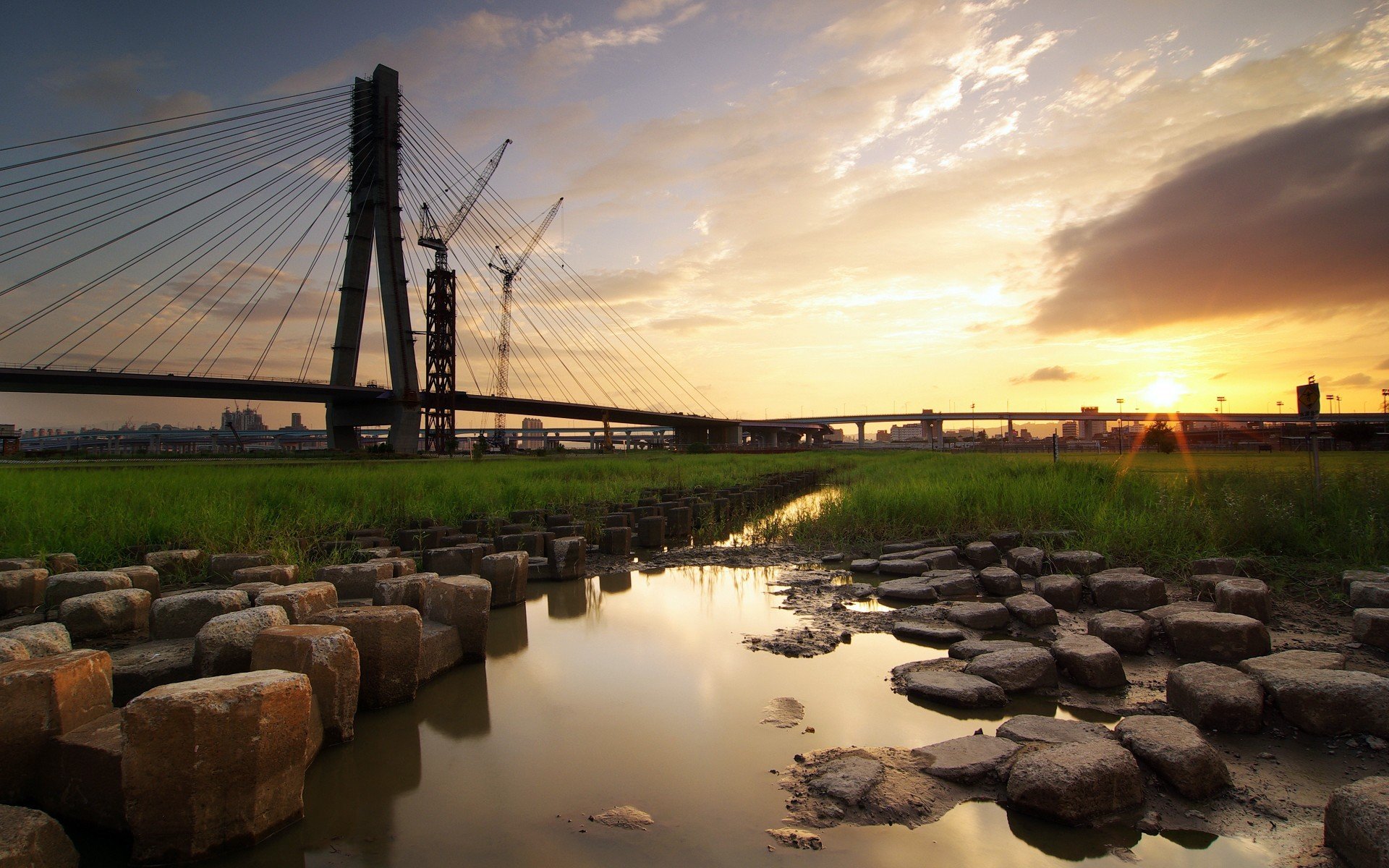 ponte costruzione tramonto pietre acqua