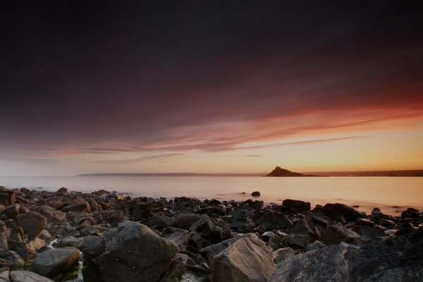 Rocky seashore at sunset