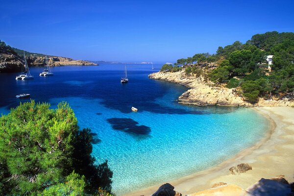 Azure bay with yachts in the sea