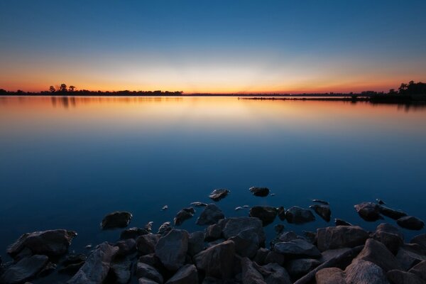 The water surface under the setting sun