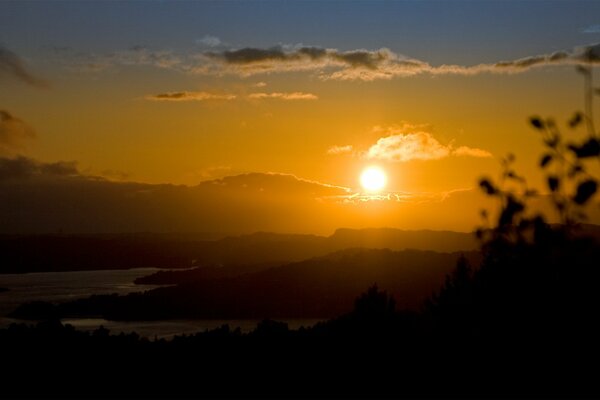 Stunning sunset on the background of the river