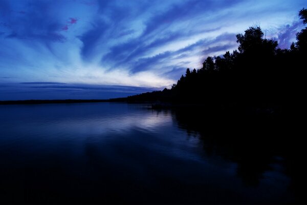 A gloomy evening falls on the river