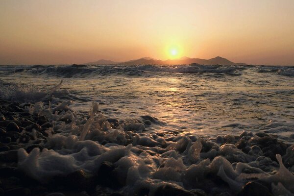 Sunset and surf waves