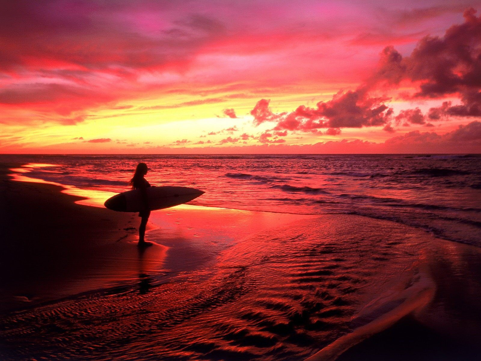 morze surfer zachód słońca czerwony