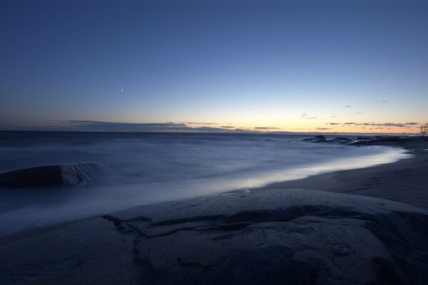 Evening sea horizon on the shore