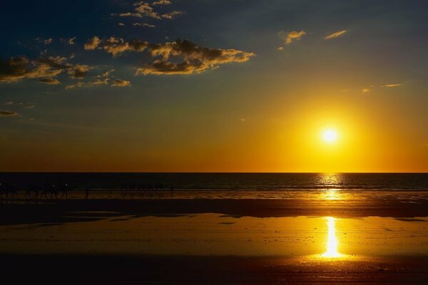 Charming sunset on the sea beach