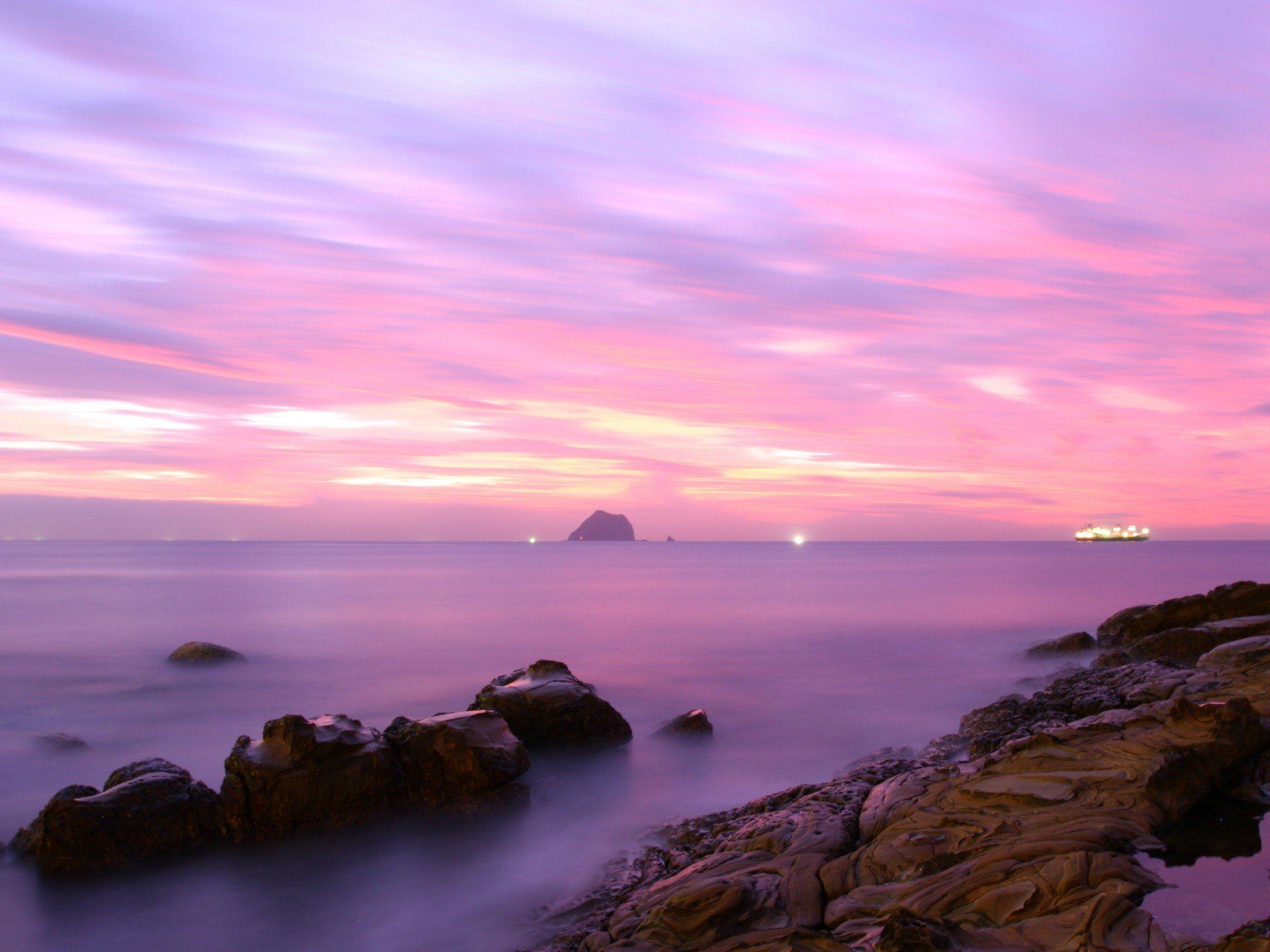 cielo horizonte barco piedras