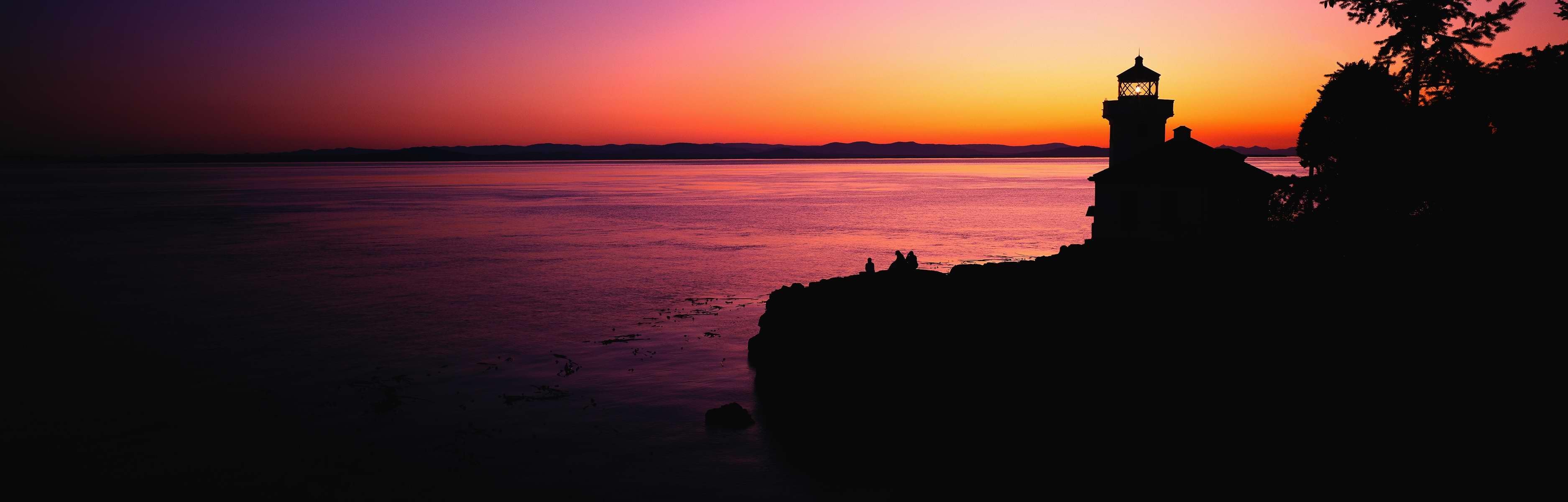 lighthouse sunset sea