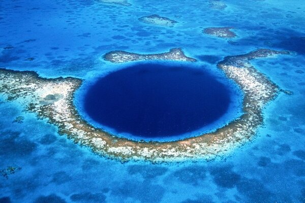 Atoll surrounding a deep lagoon