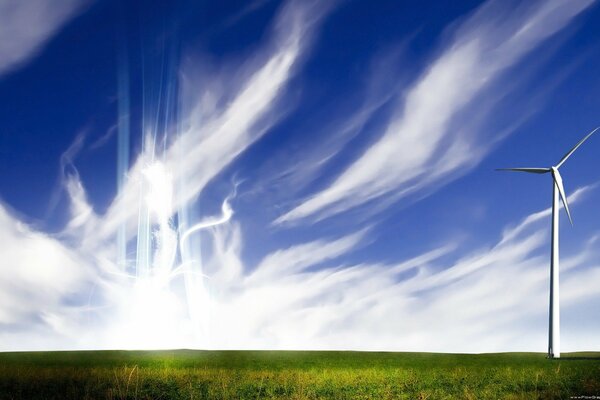 A green field above white clouds