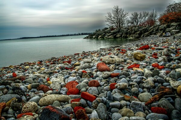 Colorful stones on the lake shore