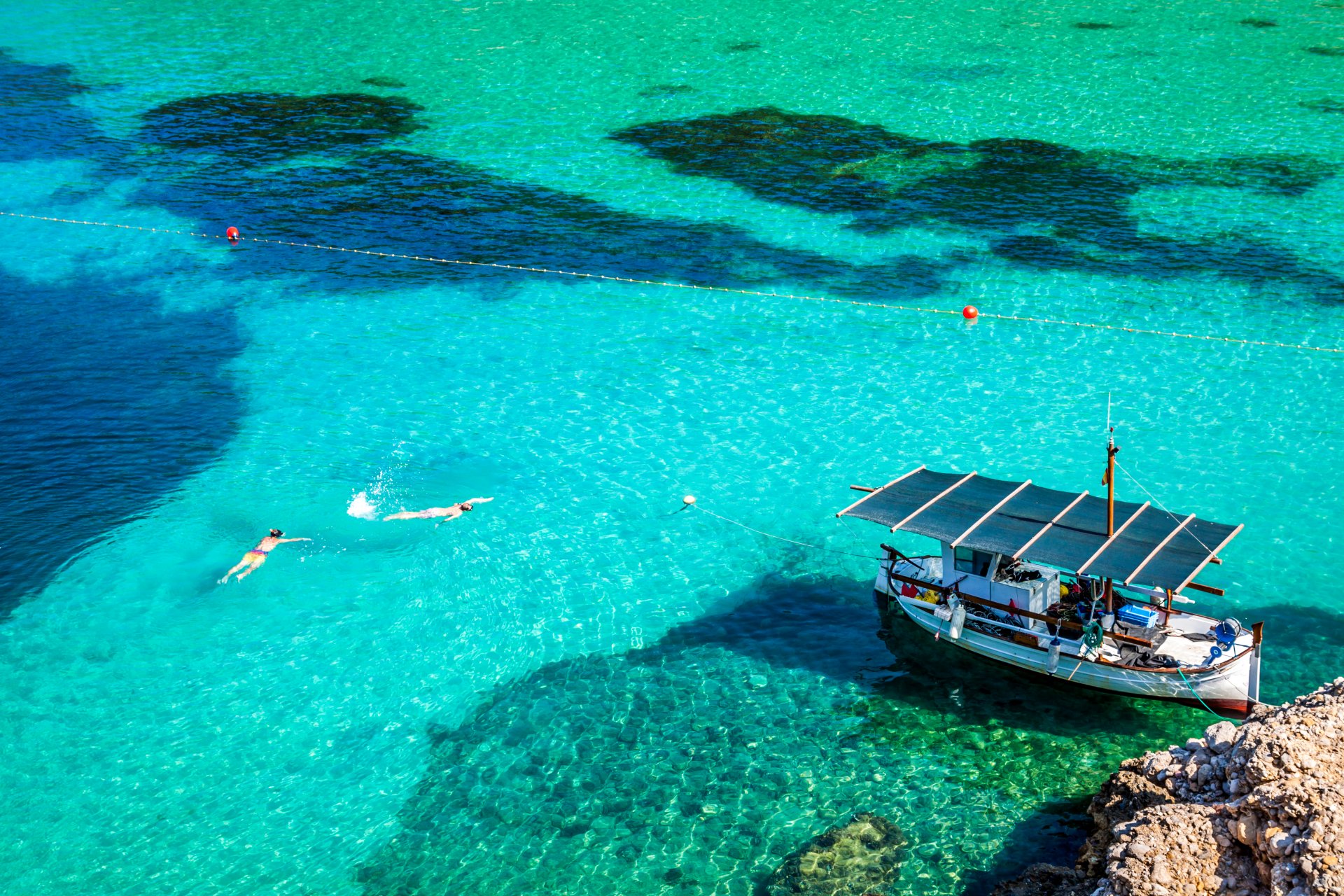 spanien san miguel ibiza meer küste steine wasser boot urlaub