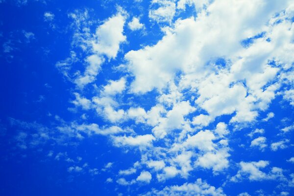 White clouds in a blue sky