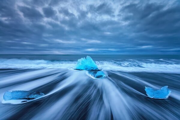 Frozen blocks of ice on the sea beach