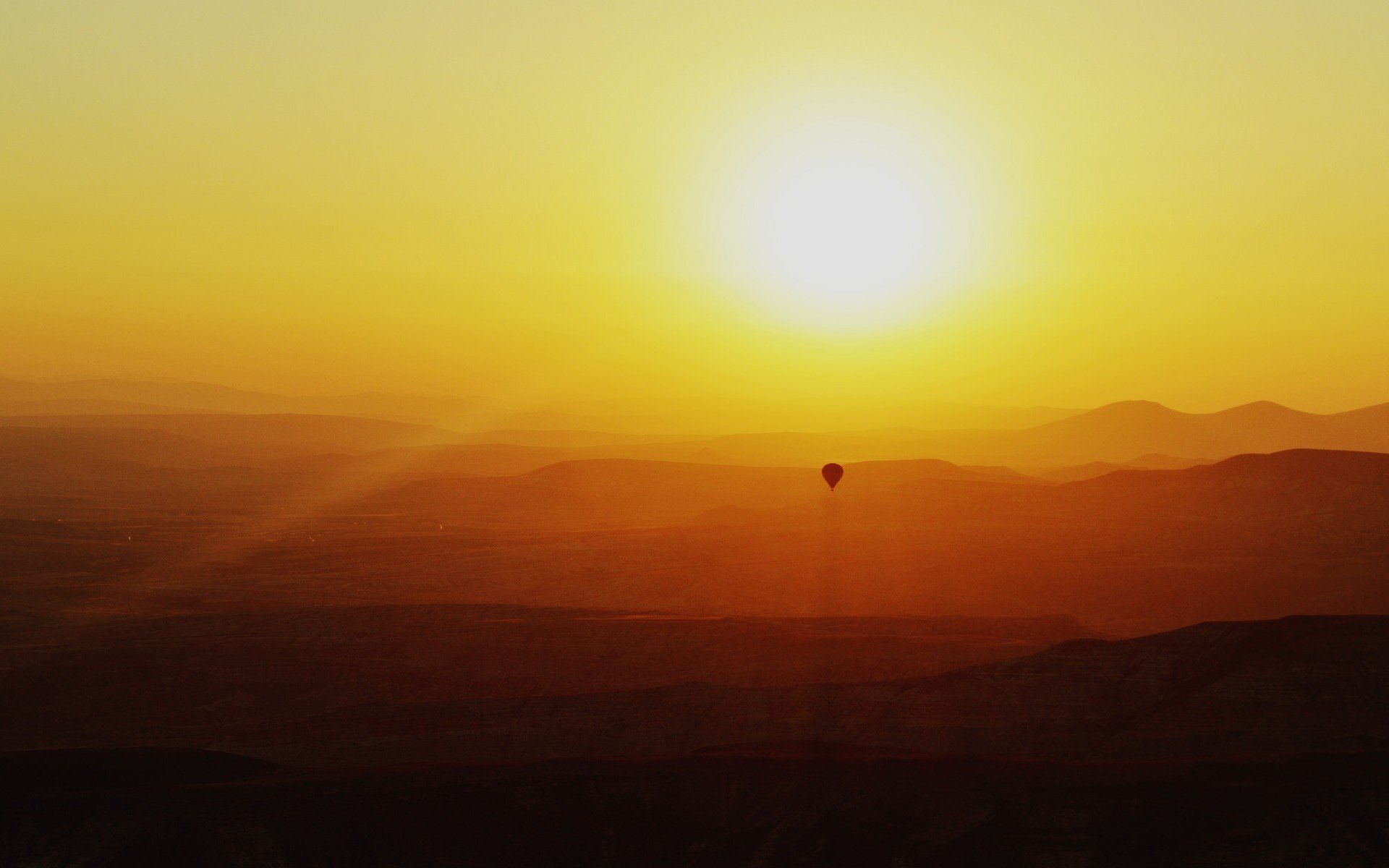 nature paysage ballon coucher de soleil ciel montagnes collines soleil vol vacances fond d écran écran large plein écran écran large