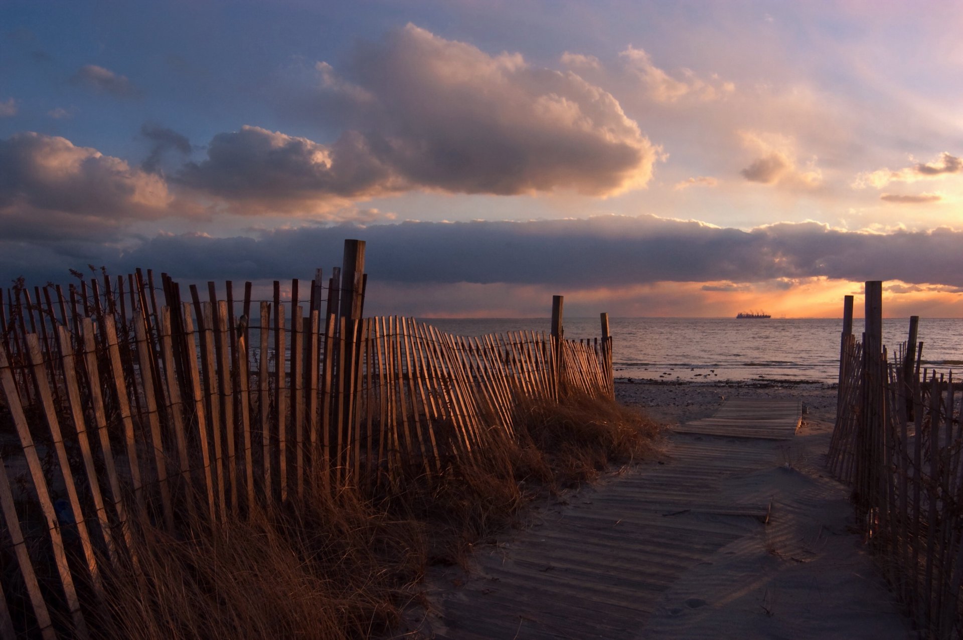 tramonto mare spiaggia recinzione