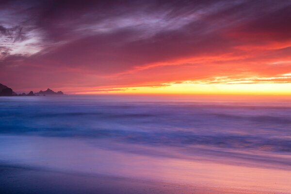 Fog lies on the beach of the USA