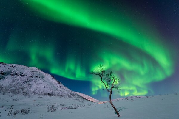 Heavenly radiance over the mountains in winter