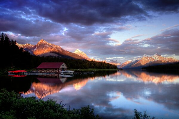 Landscape mountain house during sunset