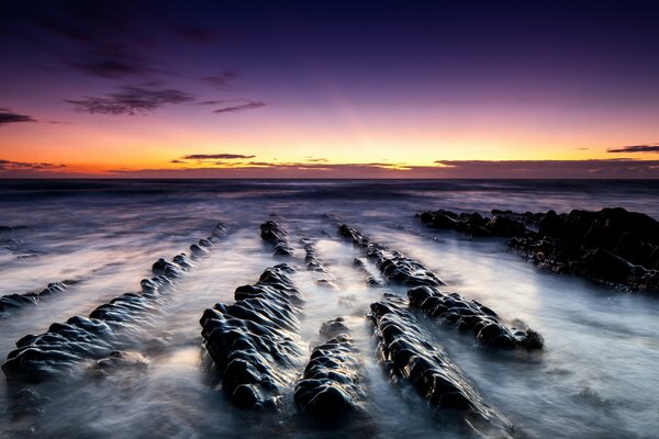 Landscape dawn rocks sand