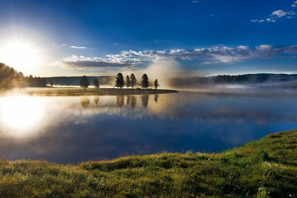 Pond in the early foggy morning