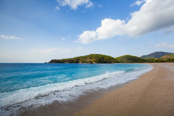 Paradise seashore with emerald water