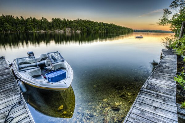 By boat on the lake in the morning