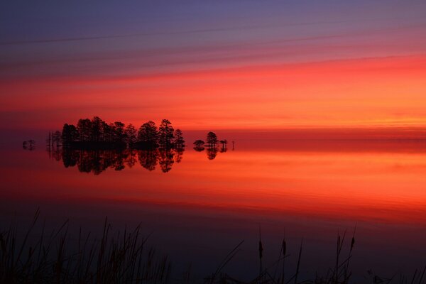 Crimson sunset on the lake