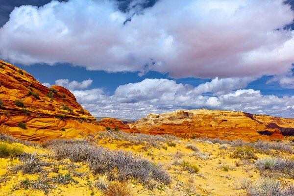 Cloudy sky over desert rocks