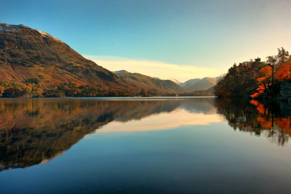 Lake near the mountains in autumn