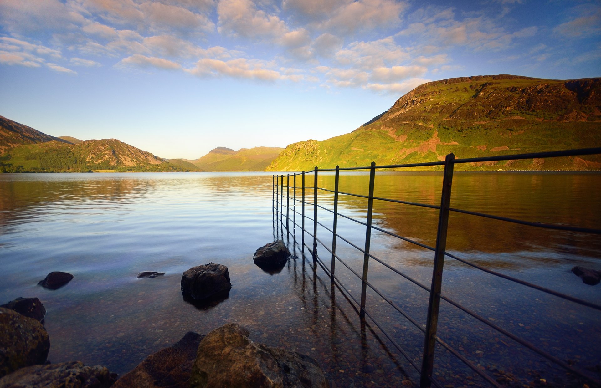 nature sea water reflection fence fence fence gate hill hills rocks sky clouds background wallpaper widescreen fullscreen widescreen widescreen