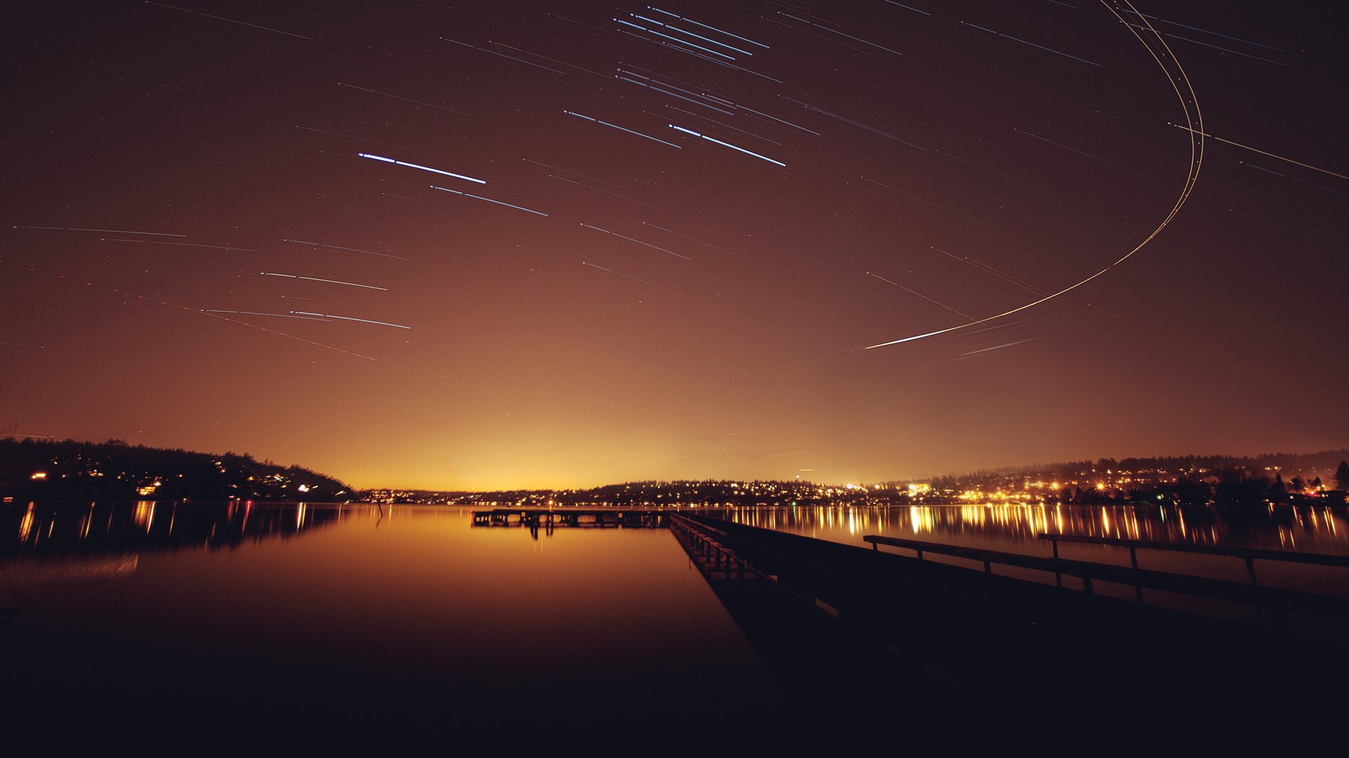 night star tracks pier reservoir lights landscape