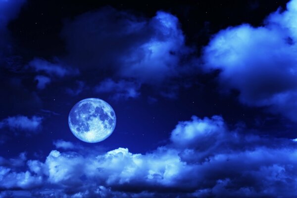 Moonlit night with beautiful clouds