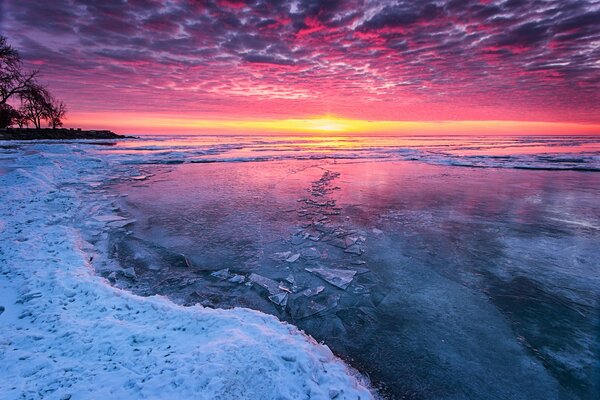 Crimson Sunset on a winter lake