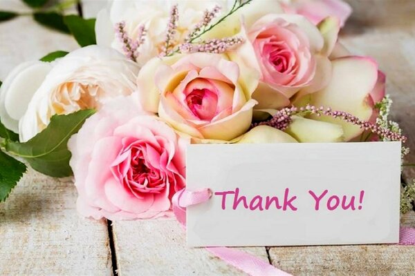 Bouquet of roses with a postcard Thank you 