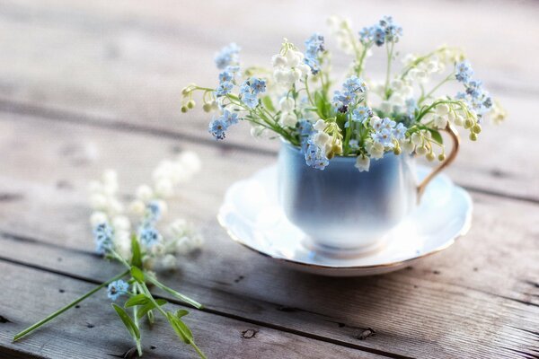 Lilies of the valley and forget-me-nots, fresh morning