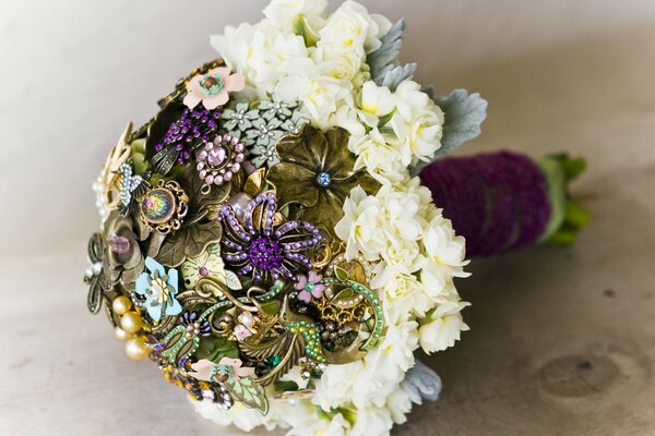 Wedding bouquet with beaded jewelry