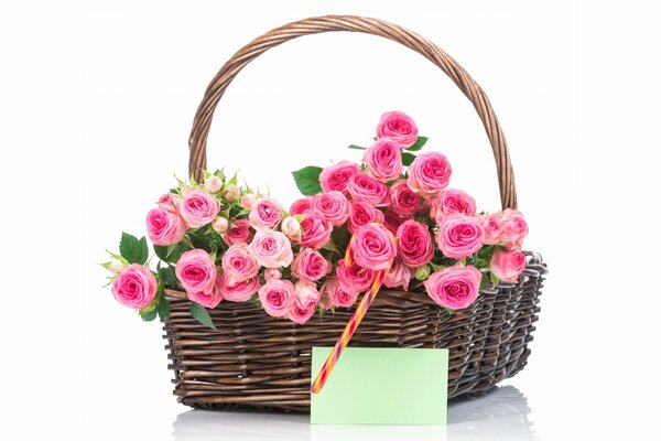 Bouquet of pink roses in a basket