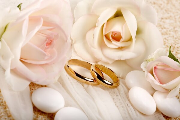 Wedding decorations on the background of roses