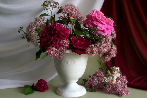 Beautiful bouquet of flowers in a white vase