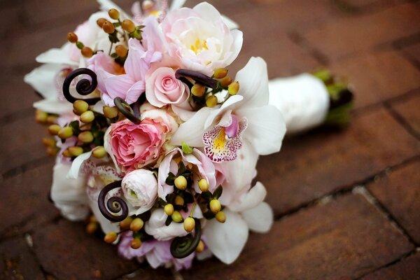 The bride s bouquet on the wooden floor