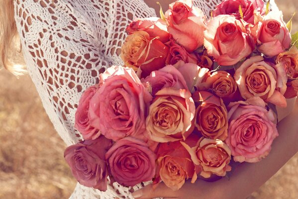 Bouquet of pink roses in your hands