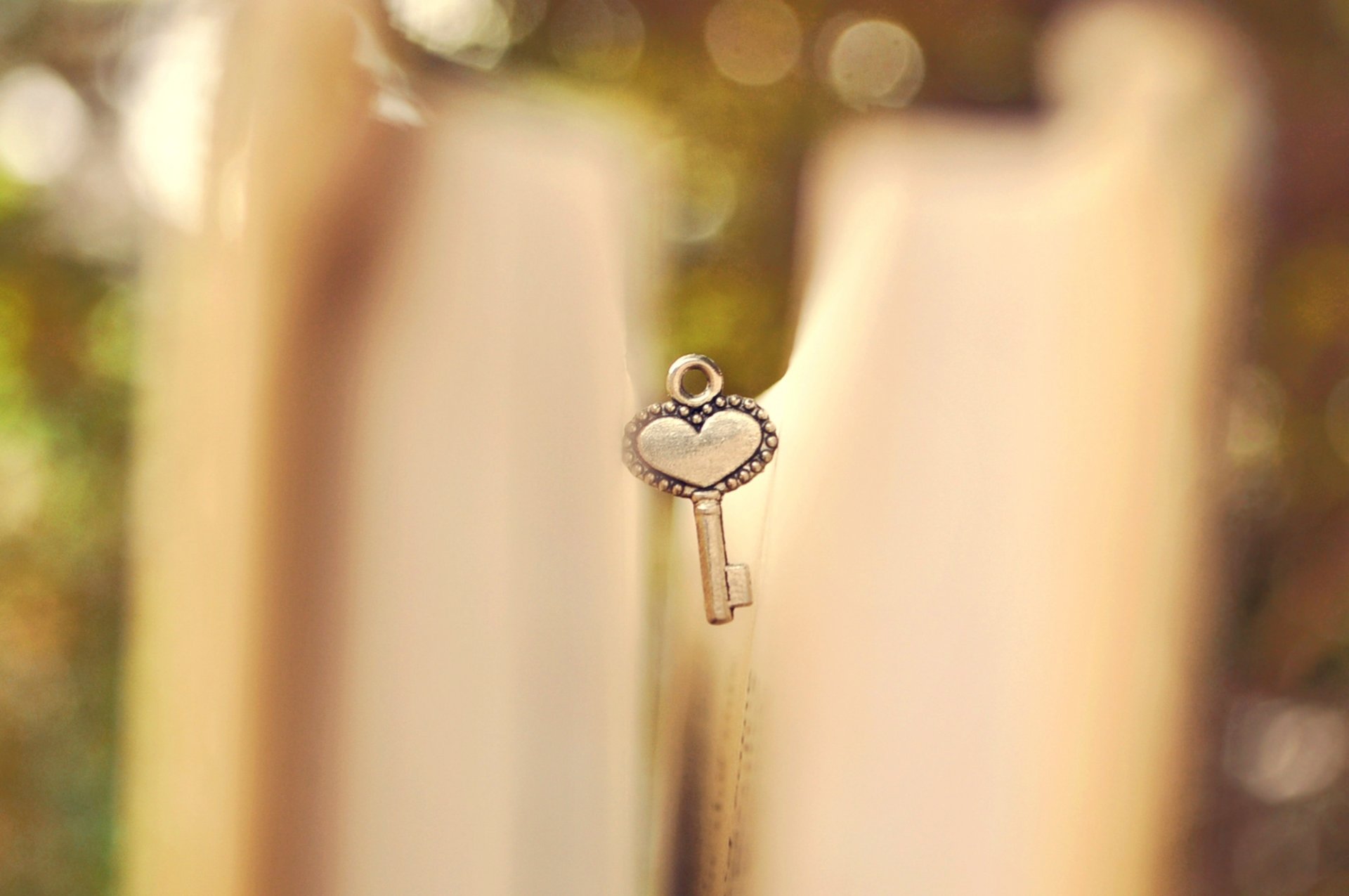 key key heart heart book pages macro blur bokeh