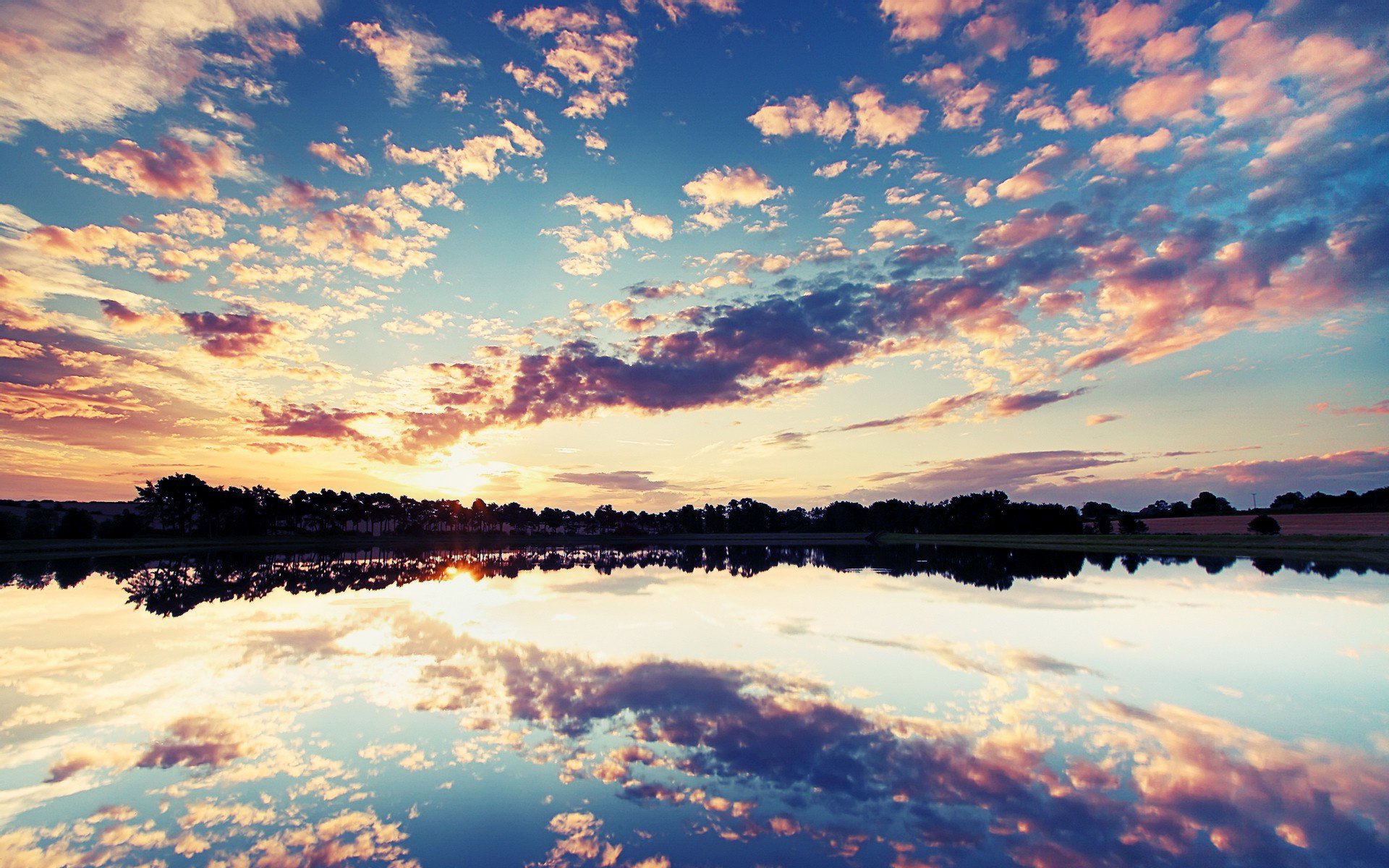 tramonto nuvole cielo lago riflessione