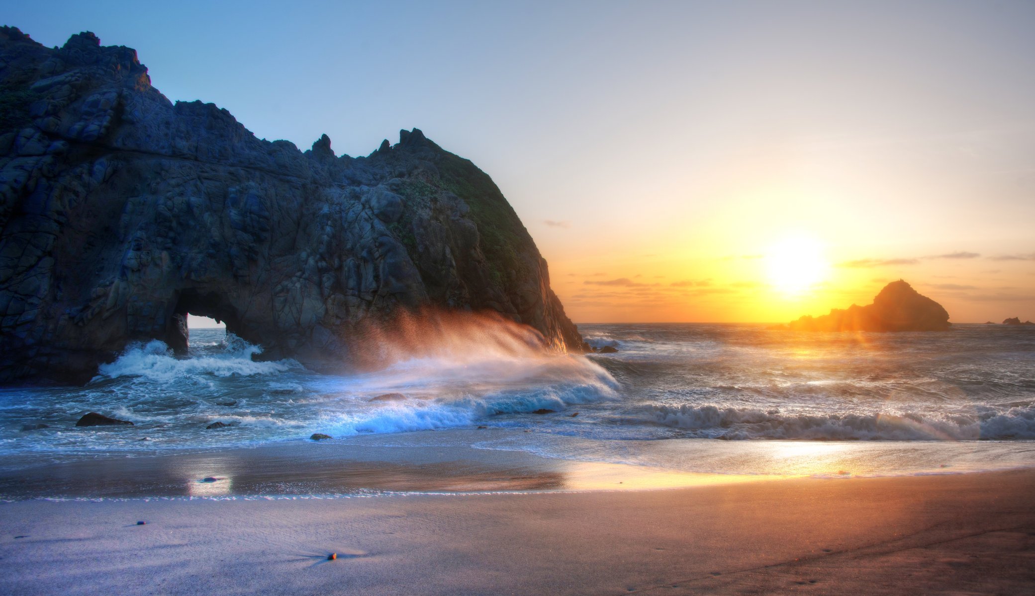 mar olas rocas arena playa cielo puesta de sol